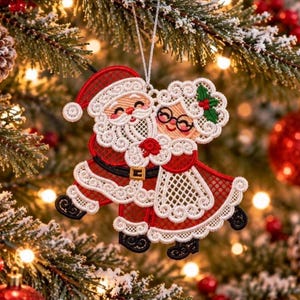 May include: A hanging Christmas tree ornament featuring an intricate white and red lace embroidery of Santa Claus and Mrs. Claus embracing. The design includes Santa in a red suit with a black belt and Mrs. Claus with glasses and holly leaves.