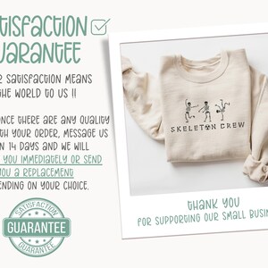 May include: A beige sweatshirt with the text "Skeleton Crew" and a graphic of three skeletons dancing. The sweatshirt is folded and photographed on a white background. The image includes a satisfaction guarantee message and a thank you message for supporting a small business.
