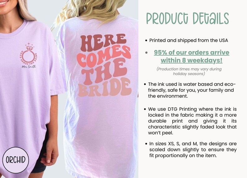 May include: A light purple t-shirt with the text "Here Comes The Bride" in pink, red, and orange retro font. The shirt is printed with a water-based, eco-friendly ink.