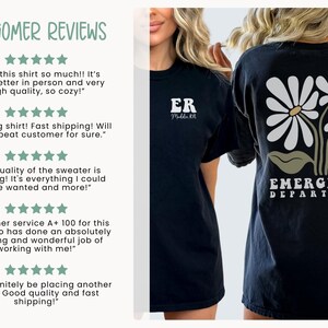 May include: Black t-shirt with a white daisy graphic and the text "Emergency Department".