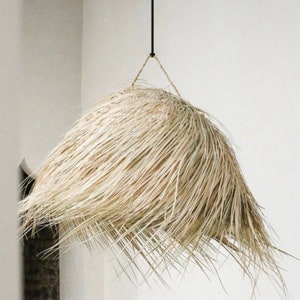 Palm leaf bell-shaped pendant light with bangs