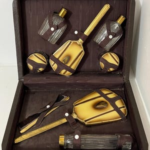 Complete vintage treinkoffer of toilettafelset van glas en messing