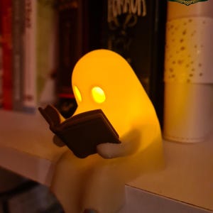 Cute little ghost sitting on a shelf reading a book with flickering tealight, book lover gift, cosy home ornament, gift idea, handmade