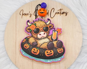 Summer-ween cow with pool floatie car freshener