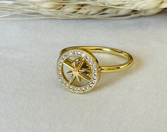 Anillo antiestrés spinner bienestar con estrella giratoria