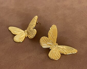 Boucles d’oreille femme papillon butterfly  en acier inoxydable doré