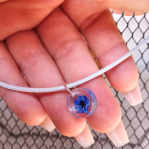 Mini dried flower blue epoxy pendant