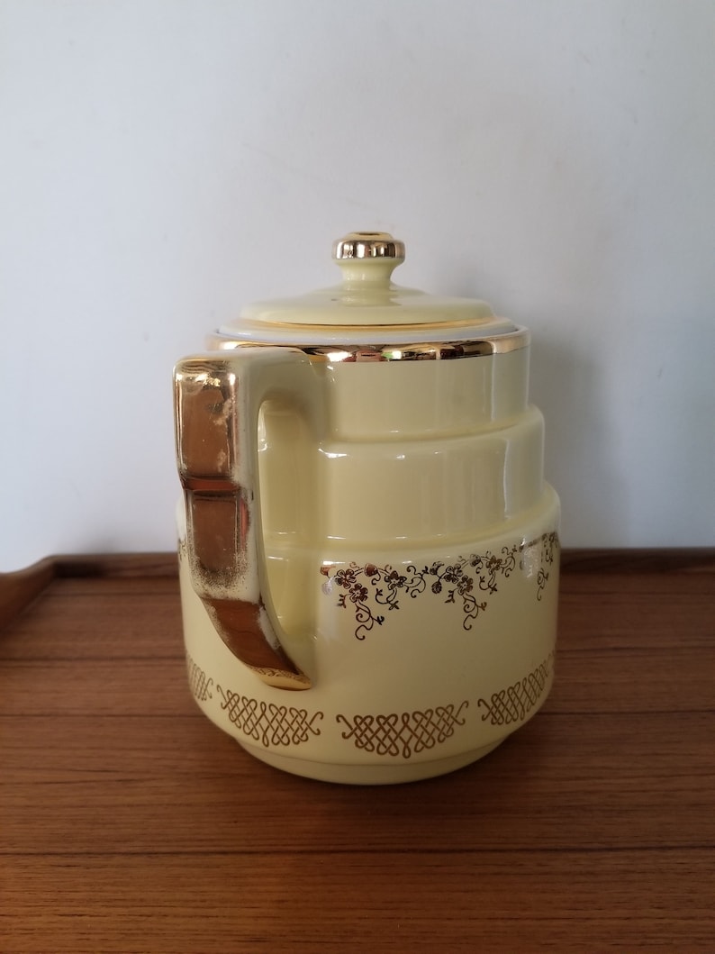 Hall's Superior Quality Kitchenware Three Piece Set Yellow and Gold