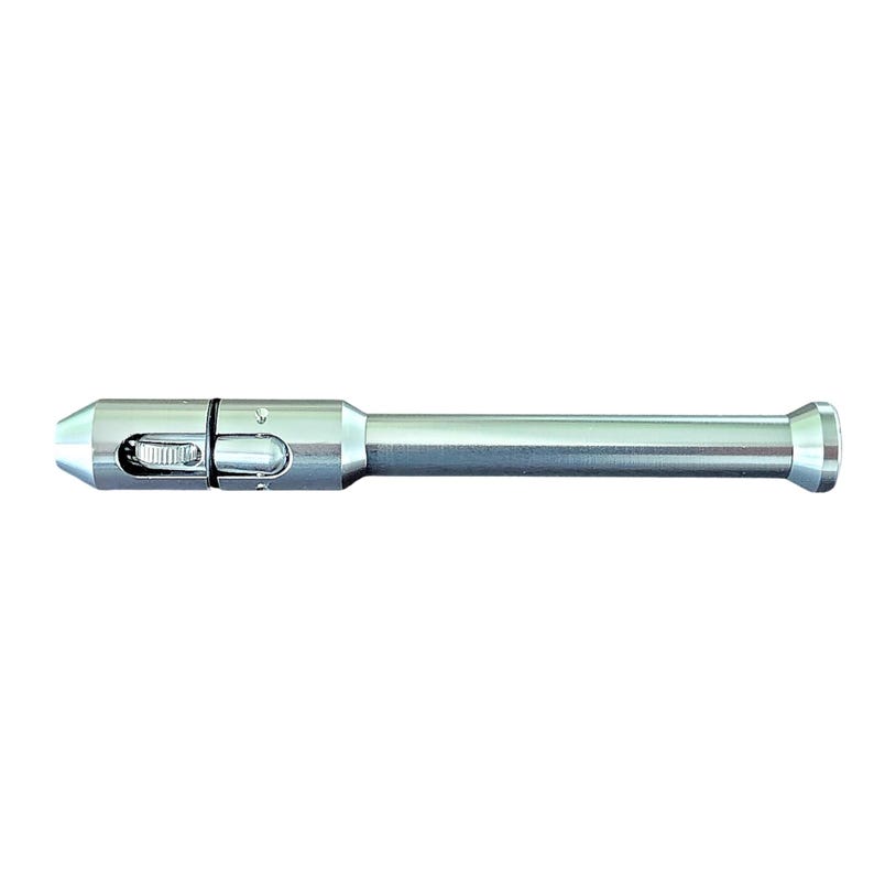 May include: A silver-colored, cylindrical tool with a textured dial and a rounded end. The tool has a long, straight body with a slightly wider end on the opposite side of the dial. The tool is designed for a specific function.