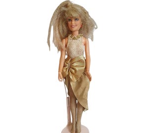 Muñeca Jem Jerrica vintage con brillo y oro de Hasbro