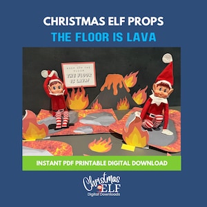 May include: A Christmas Elf scene with two elves in red outfits and hats, set against a backdrop of a lava-themed landscape. The scene includes paper flames, a volcano, and a sign that reads "KEEP OFF THE FLOOR THE FLOOR IS LAVA".