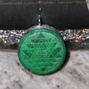 Green and shungite tetrahedron orgonite
