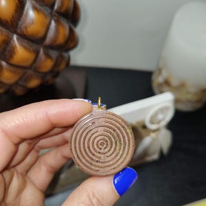 Shungite spiral orgonite with coffee mica, shungite and copper powders.