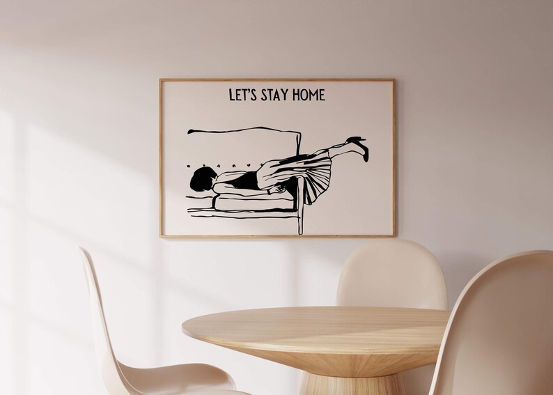 May include: Black and white illustration of a person doing a handstand on a couch. The text "Let's Stay Home" is above the illustration.
