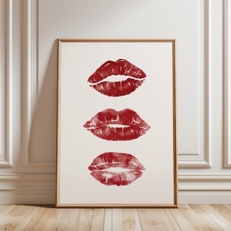 Puede incluir: Tres huellas de labios rojos en acuarela sobre un fondo blanco. Los labios est&aacute;n dispuestos verticalmente, siendo el labio superior el m&aacute;s grande y el labio inferior el m&aacute;s peque&ntilde;o.