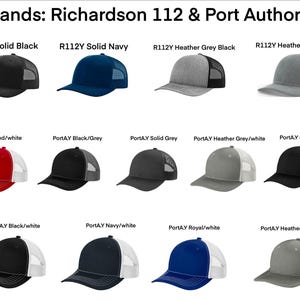 May include: A selection of trucker hats in various colors and styles, including solid black, navy, heather grey, and red/white. The hats are from the brands Richardson 112 and Port Authority.