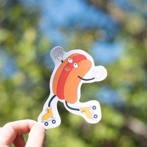 Hotdog Charakter in Rollschuhen mit Hands-Out-Aufkleber