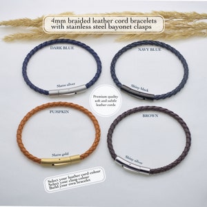 May include: Four braided leather cord bracelets with stainless steel bayonet clasps. The bracelets are in dark blue, navy blue, pumpkin orange, and brown. The clasps are available in matte silver, shiny black, matte gold, and shiny silver.