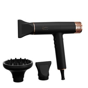May include: A black hair dryer with a rose gold accent and the word "LUMI" on the side. It comes with two attachments: a concentrator nozzle and a diffuser.