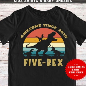 May include: Black t-shirt with a retro sunset graphic featuring a dinosaur and the text "Awesome Since 2018 Five-Rex". The text "Customize Shirt For Free" is in a red starburst.