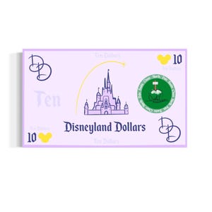 May include: A purple and white Disneyland dollar bill with a cartoon image of Cinderella's castle and a Mickey Mouse head. The bill says "Ten Dollars" and "Disneyland Dollars".