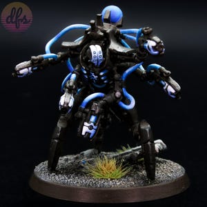 May include: A detailed miniature robot figure, primarily black with blue and white accents. The figure has multiple arms and a complex mechanical design, standing on a textured base with small patches of grass. The logo "dfs" is in the upper left corner.