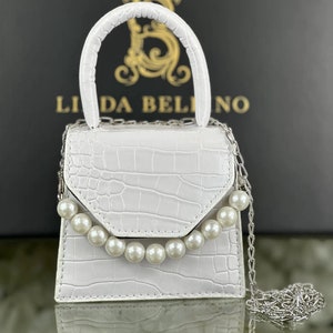 Beli handbag online best sale