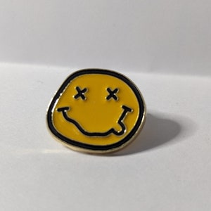 Cross-Eyed Smiley Enamel Pin