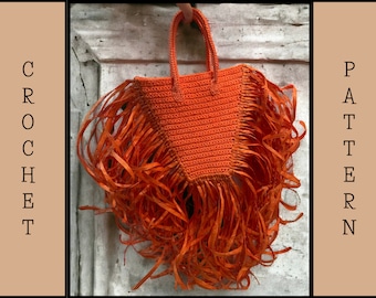 May include: Orange crochet tote bag with long fringe. The bag has a simple design and is perfect for everyday use.