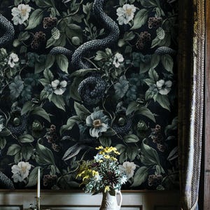 May include: A set of three ceramic mugs with a speckled, matte finish. Each mug is in a different colour: light blue, cream, and grey. The mugs have a simple, modern design with a rounded shape and a comfortable handle.