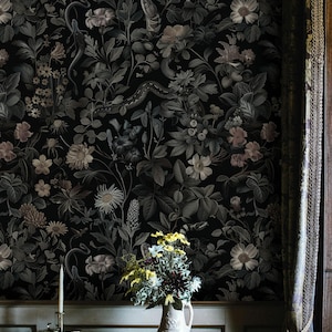 May include: A set of three ceramic mugs with a speckled, matte finish. The mugs are in shades of cream, light brown, and dark brown. Each mug has a simple, minimalist design, perfect for coffee or tea.