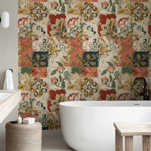 May include: A bathroom with a white bathtub and a woven basket. The wall features a patterned wallpaper with floral and ornamental designs in shades of red, green, yellow, and blue. The overall aesthetic is vintage and artistic.