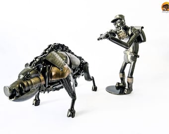 metal statuette of a hunter and a boar