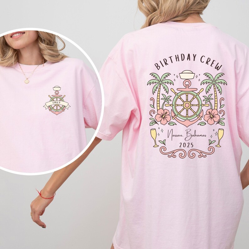 May include: Light pink t-shirt with a nautical-themed graphic on the front and back. The front features an anchor with a banner that says "EMILY". The back has a design with a ship's wheel, palm trees, and the words "BIRTHDAY CREW" and "Nassau Bahamas 2025".