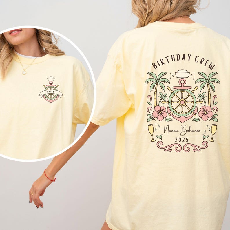 May include: A light yellow t-shirt with a nautical design. The front features an anchor and the name "Emily" on a banner. The back displays "Birthday Crew" with a ship's wheel, palm trees, and the text "Nassau, Bahamas 2025".
