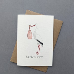 Carte de félicitations de grossesse | Cigogne avec bébé