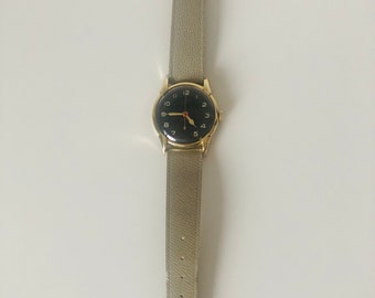 Montre-bracelet vintage Telos à remontage manuel allemand laminé or double 20 mikron acier inoxydable bracelets en cuir gris Allemagne années 1950