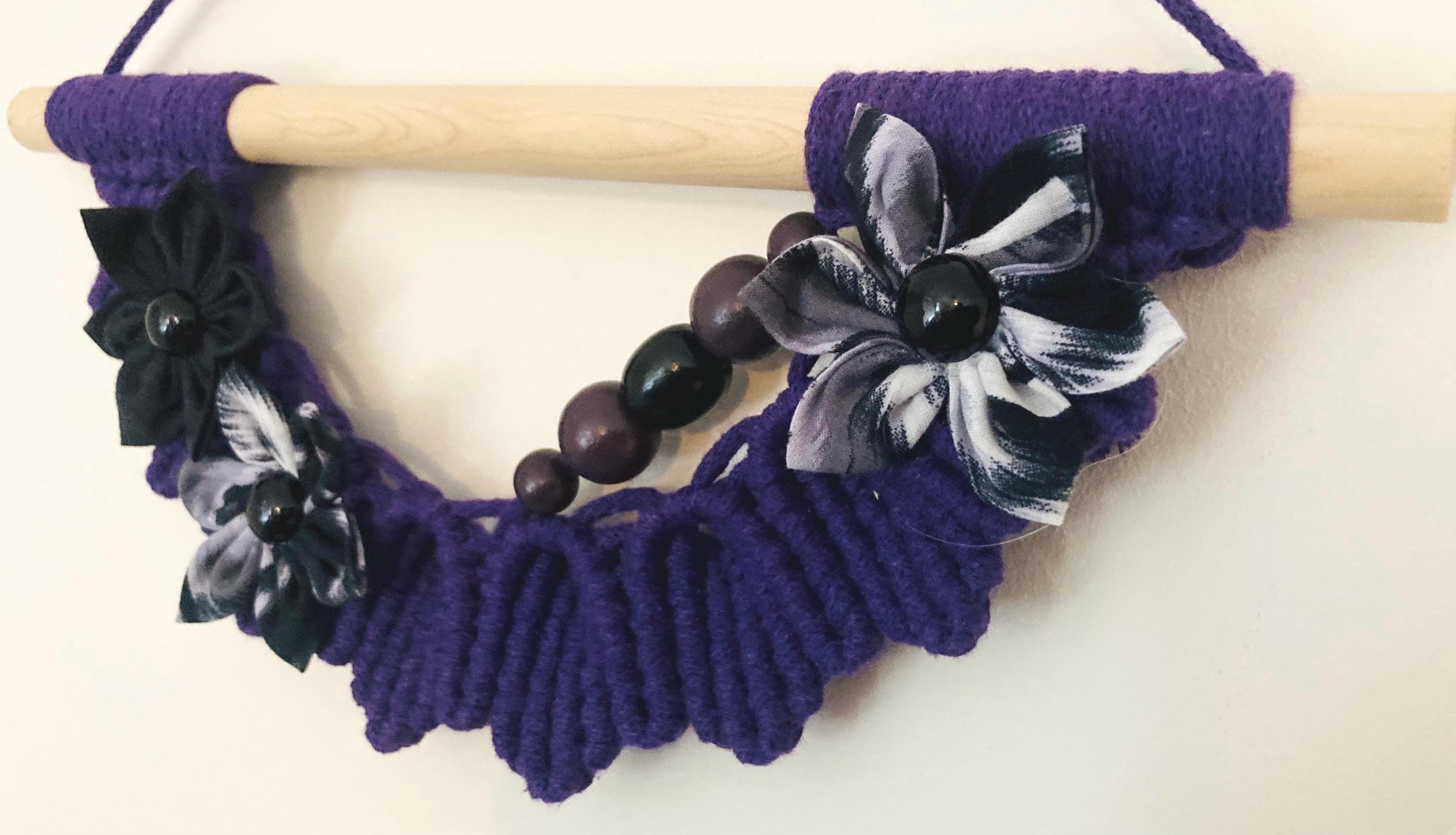 Unique Purple Macrame Wall Hanging: Boho Fabric Flowers & Wooden Beads, wall art.