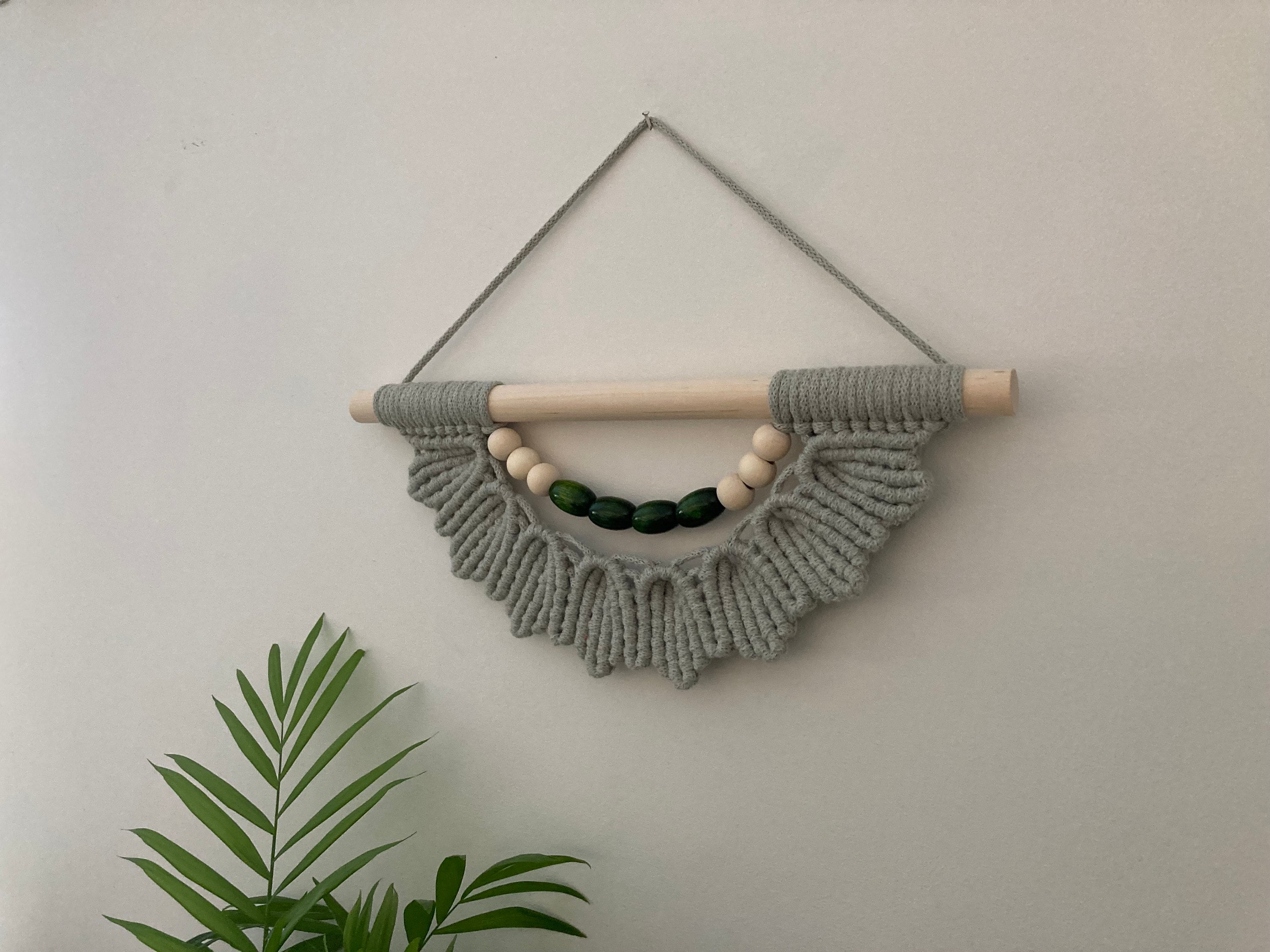 Unique Green Macrame Wall Hanging: Boho Wooden Bead Decor, wall art, hippy accessory.