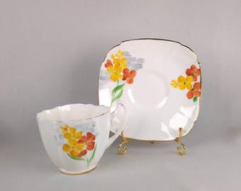 Paragon art-deco theekopje en schotel: handgeschilderd bloemenbot China, Engeland jaren 1930