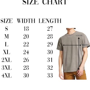 May include: Comfort Colors 1717 size chart with measurements in inches. Sizes range from S to 4XL, with widths from 18 to 30 inches and lengths from 27 to 33 inches. A person is wearing a gray t-shirt.