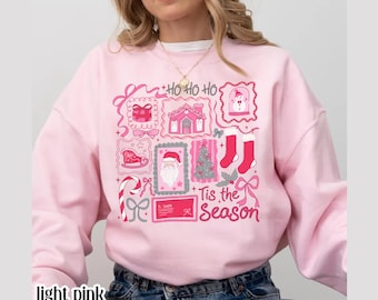 Bluza świąteczna Tis The Season: Różowy świąteczny okrągły dekolt z Mikołajem