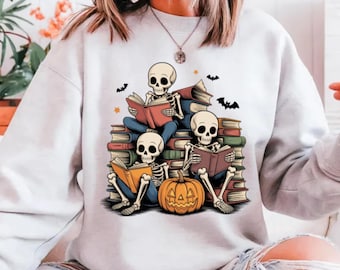 Halloween Book Lover Sweatshirt: Spooky Skeletons Reading Pumpkin Fall Shirt