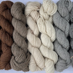 FREE shipping. 100% Alpaca 225m/100gm, 3 ply. Dark chocolate, chocolate, milk chocolate, rose brown, cream, light grey, dark grey, black.