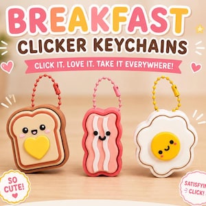 May include: Three breakfast-themed clicker keychains featuring a brown toast with a yellow heart, a pink bacon strip, and a white fried egg with a yellow yolk. Each keychain has a smiling face and a colorful ball chain. Text reads: BREAKFAST CLICKER KEYCHAINS, CLICK IT. LOVE IT. TAKE IT EVERYWHERE!, SO CUTE!, SATISFYING CLICK!