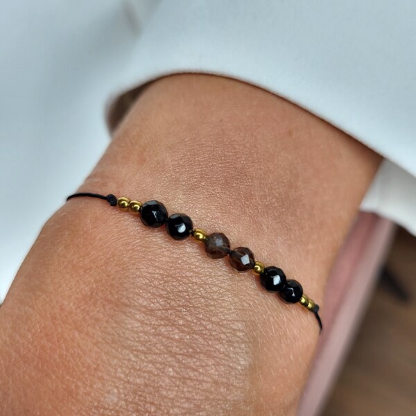 Minimalist bracelet on a thread of natural stones "soothing regeneration confusion" Black Onyx Smoky quartz Hematite