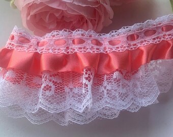 1 1/2  or 2 inch wide white/coral color  ruffled lace price per yard