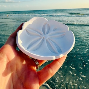 May include: A rustic wooden sign with the text "Welcome to our home" in a handwritten style. The sign features a distressed finish and a simple, inviting design, perfect for a front porch or entryway.