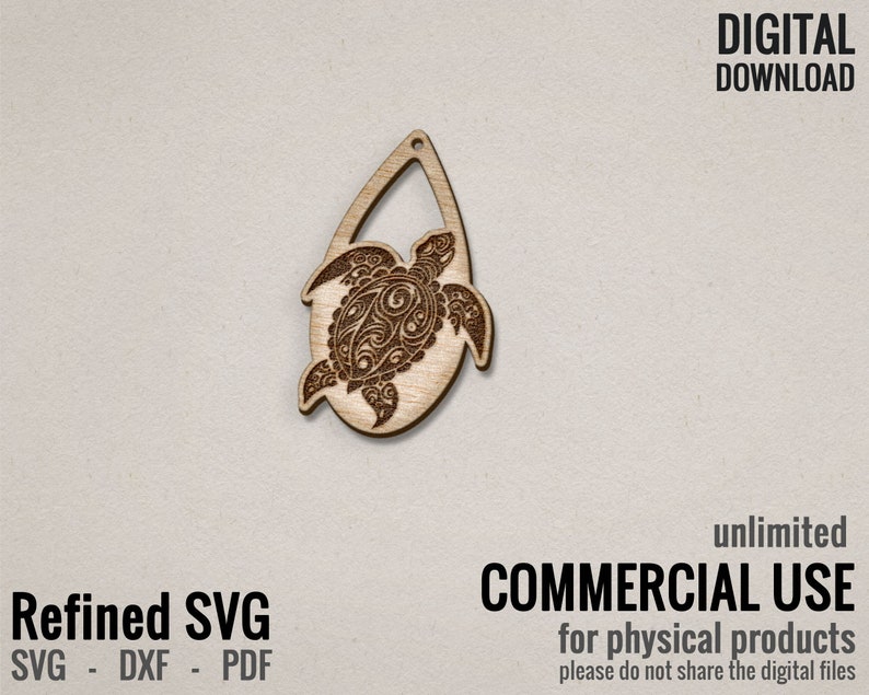 May include: A laser cut wooden cutout of a detailed turtle design. The turtle is in a teardrop shape with a hole at the top for hanging. The design is intricate and detailed, with a floral pattern on the turtle's shell.
