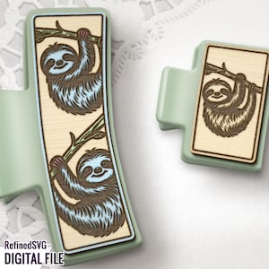 May include: Two light green, curved, decorative clips with rectangular wooden inserts. Each insert features a laser-cut sloth hanging from a branch. The sloths are brown with blue accents. The text "RefinedSVG DIGITAL FILE" is visible.